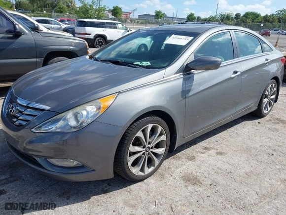 2013 Hyundai Sonata SE with VIN 5NPEC4AC2DH785966, listed as a IAAI auction lot 41966749 with 122,242 mi miles. Bid and sale history available at carsss.com. Image 2.