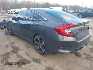 2019 Honda Civic Sport with VIN 2HGFC2F8XKH503867, listed as a IAAI auction lot 41533506 with 66,650 mi miles and . Bid and sale history available at DreamBid. Image 3.