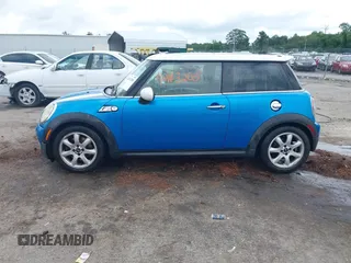 2010 MINI Hardtop S with VIN WMWMF7C55ATW88946, listed as a IAAI auction lot 42443200 with 104,953 mi miles and . Bid and sale history available at DreamBid. Image 14.