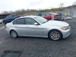2007 BMW 3 Series 328i with VIN WBAVA33557PG53078, listed as a IAAI auction lot 41936187 with 186,492 mi miles. Bid and sale history available at carsss.com. Image 13.