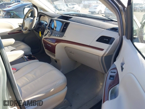2011 Toyota Sienna XLE AAS with VIN 5TDYK3DC4BS072693, listed as a IAAI auction lot 41579262 with 146,201 mi miles. Bid and sale history available at carsss.com. Image 5.