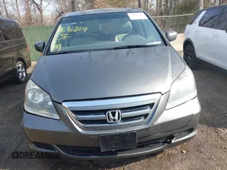 2007 Honda Odyssey EX-L z VIN 5FNRL38717B070328, wystawiony jako IAAI lot #41696829 z przebiegiem 171 229 mil mil oraz . Historia ofert i sprzedaży dostępna na DreamBid. Obrazek 12.