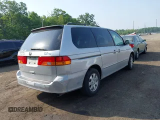 2002 Honda Odyssey EX-L z VIN 2HKRL18062H533064, wystawiony jako IAAI lot #42273694 z przebiegiem Nie podano mil oraz . Historia ofert i sprzedaży dostępna na DreamBid. Obrazek 4.