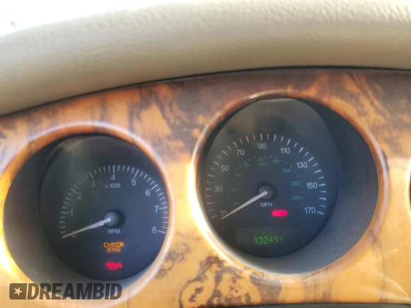 1998 Jaguar XJ with VIN SAJHX1245WC819762, listed as a Copart auction lot 81480174 with 132,491 mi miles and Salvage title. Bid and sale history available at DreamBid. Image 9.
