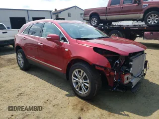 2023 Cadillac XT5 FWD Premium Luxury with VIN 1GYKNCR44PZ169259, listed as a Copart auction lot 66371794 with 13,319 mi miles and Salvage Title. Bid and sale history available at carsss.com. Image 4.