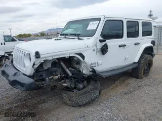 2019 Jeep Wrangler Unlimited Sport with VIN 1C4HJXDG0KW505973, listed as a IAAI auction lot 41736235 with 118,867 mi miles. Bid and sale history available at carsss.com. Image 2.