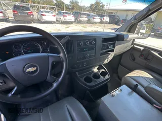 2013 Chevrolet Express Cargo with VIN 1GCZGUCG6D1167644, listed as a Copart auction lot 82365784 with 230,437 mi miles and Clean Title. Bid and sale history available at DreamBid. Image 9.