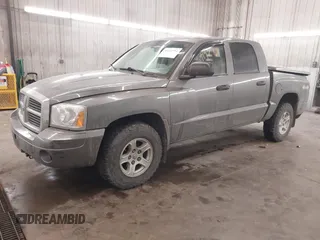2007 Dodge Dakota SLT z VIN 1D7HW48J17S138642, wystawiony jako IAAI lot #41419794 z przebiegiem 79 350 mil mil oraz . Historia ofert i sprzedaży dostępna na DreamBid. Obrazek 2.