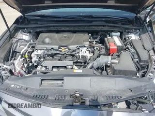 2019 Toyota Camry LE with VIN 4T1B11HK9KU229110, listed as a IAAI auction lot 42133332 with 17,541 mi miles and . Bid and sale history available at DreamBid. Image 10.