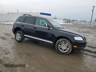 2004 Volkswagen Touareg z VIN WVGBC77LX4D062055, wystawiony jako Copart lot #45960445 z przebiegiem 201 819 mil mil oraz Szkoda całkowita • Salvage title. Historia ofert i sprzedaży dostępna na DreamBid. Obrazek 4.