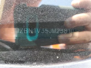 2018 Mazda 3 Touring z VIN 3MZBN1V35JM238103, wystawiony jako Copart lot #56770875 z przebiegiem 66 747 mil mil oraz Szkoda całkowita • Salvage title. Historia ofert i sprzedaży dostępna na DreamBid. Obrazek 13.