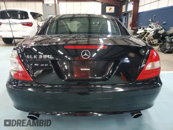 2005 Mercedes-Benz SLK-Class with VIN WDBWK56FX5F049285, listed as a Copart auction lot 73306494 with 94,785 mi miles and Salvage Title. Bid and sale history available at carsss.com. Image 6.