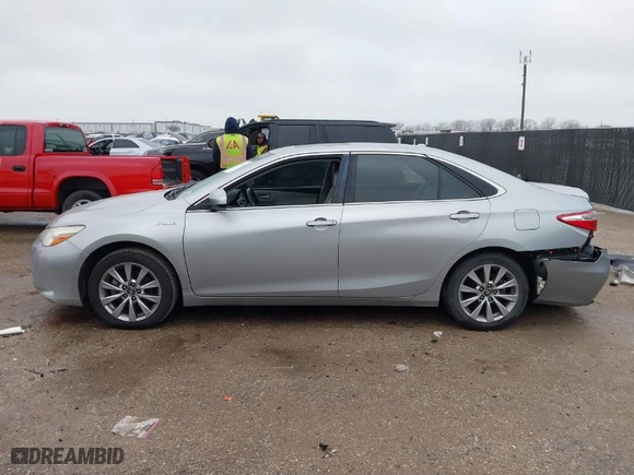 2016 Toyota Camry Hybrid LE with VIN 4T1BD1FK2GU197571, listed as a IAAI auction lot 41555317 with 101,464 mi miles. Bid and sale history available at carsss.com. Image 14.