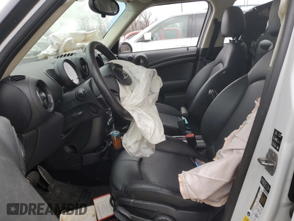 2015 MINI Countryman S with VIN WMWZC5C54FWP45274, listed as a Copart auction lot 47877695 with Not Provided miles and Salvage Title. Bid and sale history available at DreamBid. Image 7.