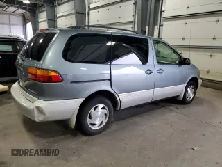 2000 Toyota Sienna LE z VIN 4T3ZF13C7YU284445, wystawiony jako Copart lot #52452465 z przebiegiem 150 609 mil mil oraz Szkoda całkowita • Salvage title. Historia ofert i sprzedaży dostępna na DreamBid. Obrazek 3.
