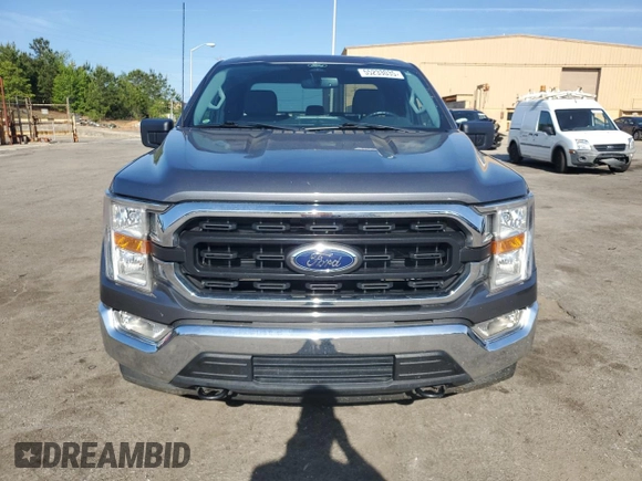 2022 Ford F-150 XL with VIN 1FTFX1E58NFB61927, listed as a Copart auction lot 55233035 with 66,591 mi miles and Salvage title. Bid and sale history available at DreamBid. Image 5.