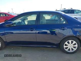 2011 Toyota Corolla L with VIN JTDBU4EE9B9167657, listed as a IAAI auction lot 41970387 with 89,300 mi miles. Bid and sale history available at carsss.com. Image 15.