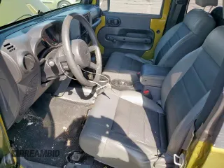 2008 Jeep Wrangler X with VIN 1J4FA24148L617265, listed as a Copart auction lot 53054495 with 143,270 mi miles and Salvage Title. Bid and sale history available at DreamBid. Image 7.