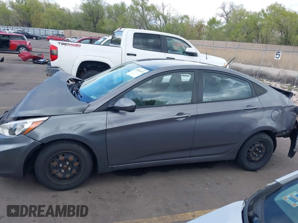 2015 Hyundai Accent GLS with VIN KMHCT4AE8FU825898, listed as a IAAI auction lot 42066640 with 79,593 mi miles and . Bid and sale history available at DreamBid. Image 14.