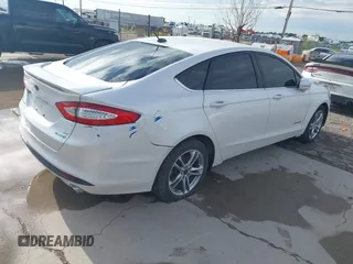 2016 Ford Fusion SE Hybrid z VIN 3FA6P0LU2GR202472, wystawiony jako IAAI lot #42637403 z przebiegiem Nie podano mil oraz . Historia ofert i sprzedaży dostępna na DreamBid. Obrazek 4.