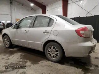 2012 Suzuki SX4 LE with VIN JS2YC5A38C6302014, listed as a Copart auction lot 47006645 with 176,113 mi miles and Salvage Title. Bid and sale history available at DreamBid. Image 2.