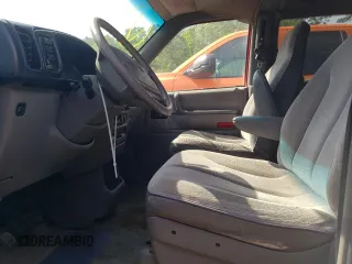 1995 Dodge Caravan z VIN 2B4GH45R0SR316476, wystawiony jako Copart lot #54975595 z przebiegiem 282 544 mil mil oraz Tytuł czysty. Historia ofert i sprzedaży dostępna na DreamBid. Obrazek 7.