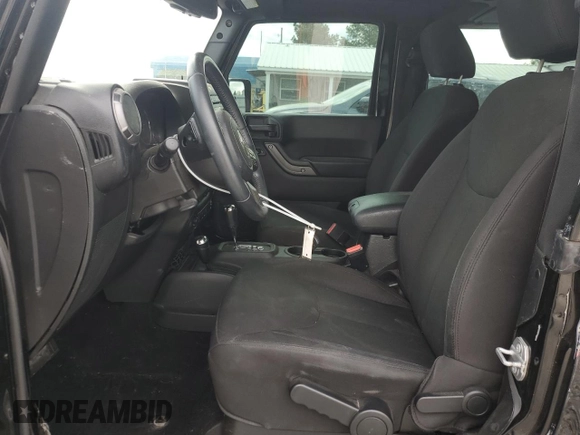 2017 Jeep Wrangler Sport with VIN 1C4AJWAG1HL618454, listed as a Copart auction lot 50206695 with 90,324 mi miles and Salvage Title. Bid and sale history available at DreamBid. Image 7.
