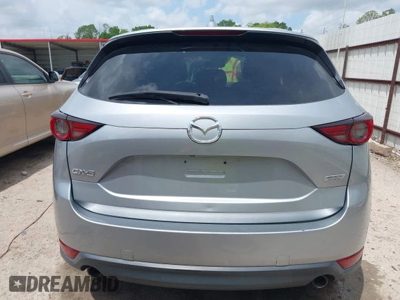 2018 Mazda CX-5 Grand Touring with VIN JM3KFADM6J0339185, listed as a IAAI auction lot 42160763 with 86,312 mi miles and . Bid and sale history available at DreamBid. Image 16.