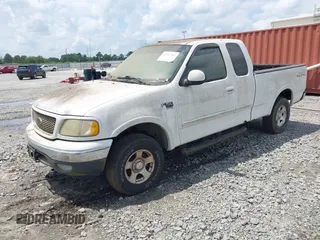 2003 Ford F-150 XL z VIN 1FTRX18W03NA25313, wystawiony jako IAAI lot #42147555 z przebiegiem 143 837 mil mil oraz . Historia ofert i sprzedaży dostępna na DreamBid. Obrazek 2.