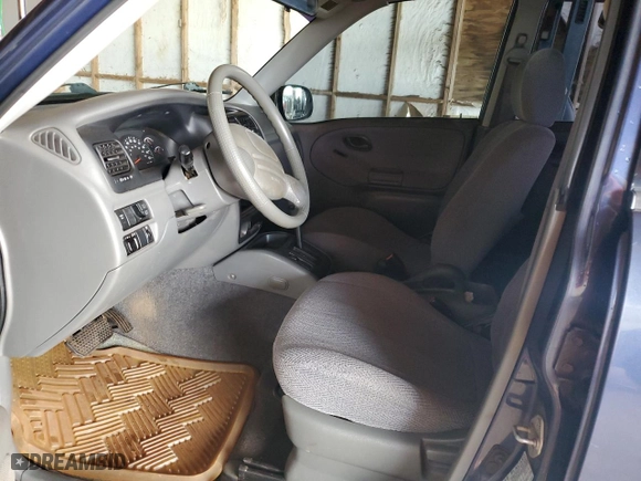 2000 Suzuki Grand Vitara JLX with VIN JS3TD62VXY4110167, listed as a Copart auction lot 77887674 with 126,214 mi miles and Salvage Title. Bid and sale history available at carsss.com. Image 7.