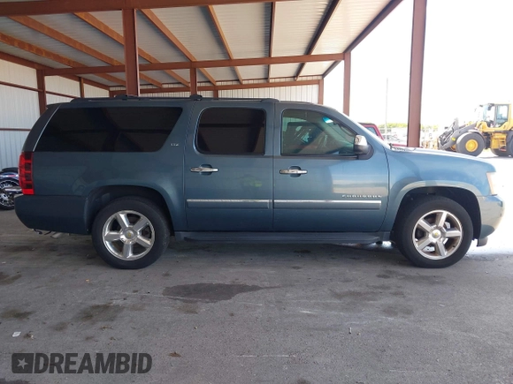2009 Chevrolet Suburban LTZ with VIN 1GNFC36J29R293712, listed as a IAAI auction lot 42577800 with 202,593 mi miles and . Bid and sale history available at DreamBid. Image 13.