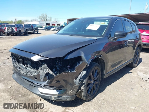 2017 Mazda CX-5 Grand Touring with VIN JM3KFBDLXH0225634, listed as a IAAI auction lot 42092029 with 86,373 mi miles and . Bid and sale history available at carsss.com. Image 2.