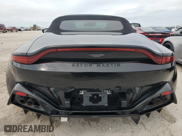 2023 Aston Martin Vantage z VIN SCFSMGBW9PGP08760, wystawiony jako Copart lot #74983814 z przebiegiem 1916 mil mil oraz Nie do naprawy. Historia ofert i sprzedaży dostępna na DreamBid. Obrazek 6.