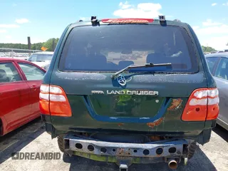 2001 Toyota Land Cruiser z VIN JTEHT05J612006883, wystawiony jako IAAI lot #42351679 z przebiegiem 177 690 mil mil oraz . Historia ofert i sprzedaży dostępna na DreamBid. Obrazek 6.