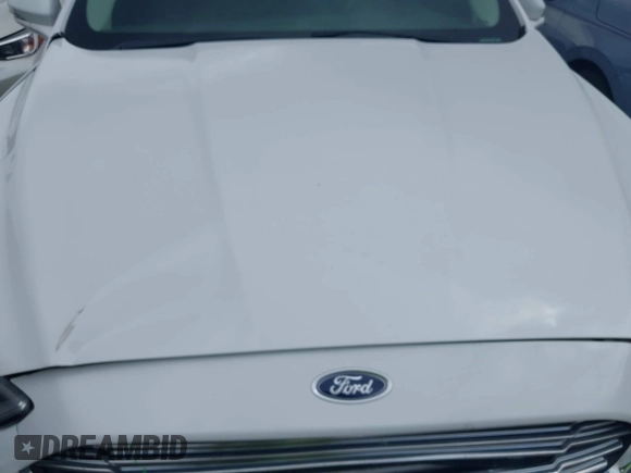 2015 Ford Fusion SE Hybrid with VIN 3FA6P0LU8FR215788, listed as a IAAI auction lot 42038194 with 136,949 mi miles and . Bid and sale history available at DreamBid. Image 18.