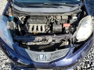 2009 Honda Fit Sport z VIN JHMGE88469S033171, wystawiony jako Copart lot #53021475 z przebiegiem 147 103 mil mil oraz Czysty tytuł • Clean title. Historia ofert i sprzedaży dostępna na DreamBid. Obrazek 11.