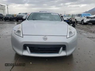 2009 Nissan 370Z Touring with VIN JN1AZ44E89M409220, listed as a Copart auction lot 43701504 with 145,099 mi miles and Salvage Title. Bid and sale history available at carsss.com. Image 5.