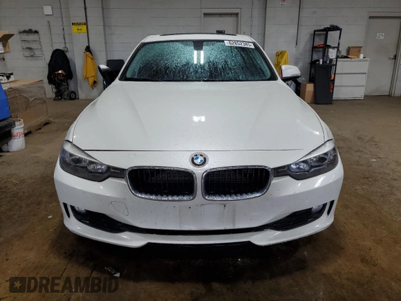 2013 BMW 3 Series 320i xDrive with VIN WBA3C3C5XDF982732, listed as a Copart auction lot 62852385 with 134,466 mi miles and Salvage title. Bid and sale history available at DreamBid. Image 5.