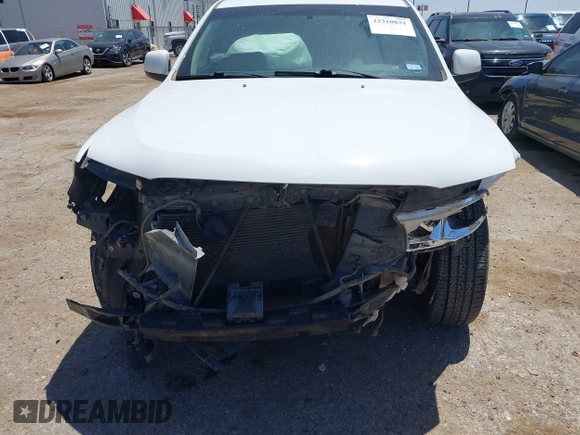 2013 Dodge Durango SXT with VIN 1C4RDHAG0DC696904, listed as a IAAI auction lot 42310831 with 112,964 mi miles and . Bid and sale history available at DreamBid. Image 6.