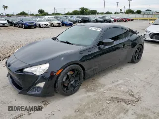 2015 Scion FR-S z VIN JF1ZNAA11F9708757, wystawiony jako Copart lot #59306265 z przebiegiem 129 908 mil mil oraz Szkoda całkowita • Salvage title. Historia ofert i sprzedaży dostępna na DreamBid. Obrazek 1.