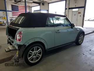 2012 MINI Convertible S с VIN WMWZP3C55CT249664, выставлен на аукционе Copart как лот 63120145 с пробегом 59 197 миль миль и Списание • Salvage title. История ставок и продаж доступна на DreamBid. Изображение 3.