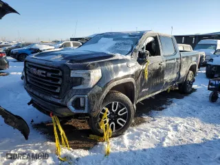 2021 GMC Sierra 1500 AT4 with VIN 1GTU9EET5MZ218086, listed as a Copart auction lot 42220855 with 53,759 mi miles and Salvage Title. Bid and sale history available at carsss.com. Image 1.
