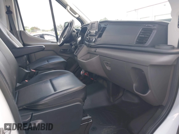 2023 Ford Transit z VIN 1FDBF6ZG0PKB35192, wystawiony jako IAAI lot #42191303 z przebiegiem 207 810 mil mil oraz . Historia ofert i sprzedaży dostępna na DreamBid. Obrazek 5.