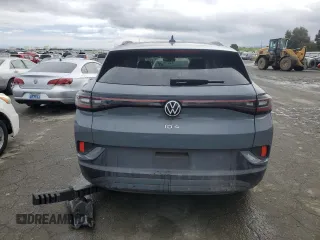 2023 Volkswagen ID.4 Pro z VIN 1V2VMPE81PC052505, wystawiony jako Copart lot #43619985 z przebiegiem Nie podano mil oraz Szkoda całkowita • Salvage title. Historia ofert i sprzedaży dostępna na DreamBid. Obrazek 6.