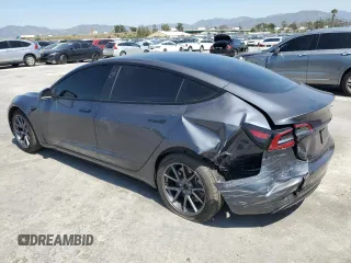 2023 Tesla Model 3 with VIN 5YJ3E1EA8PF616210, listed as a Copart auction lot 49340685 with 38,483 mi miles and Salvage Title. Bid and sale history available at DreamBid. Image 2.