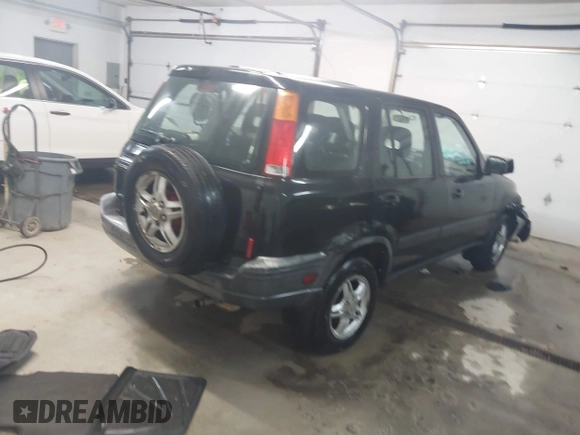 2000 Honda CR-V EX with VIN JHLRD1865YS007202, listed as a IAAI auction lot 41801108 with 134,387 mi miles. Bid and sale history available at carsss.com. Image 4.
