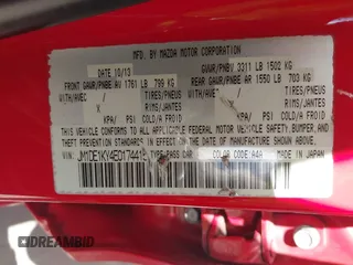 2014 Mazda 2 Sport with VIN JM1DE1KY4E0174415, listed as a IAAI auction lot 42190504 with 179,864 mi miles. Bid and sale history available at carsss.com. Image 9.