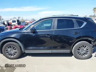 2019 Mazda CX-5 Sport with VIN JM3KFABM7K1579747, listed as a IAAI auction lot 41965097 with 151,042 mi miles and . Bid and sale history available at DreamBid. Image 15.