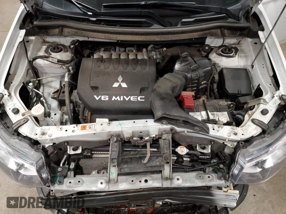 2015 Mitsubishi Outlander GT z VIN JA4JZ4AXXFZ013771, wystawiony jako Copart lot #60136855 z przebiegiem 175 489 mil mil oraz Szkoda całkowita • Salvage title. Historia ofert i sprzedaży dostępna na DreamBid. Obrazek 12.