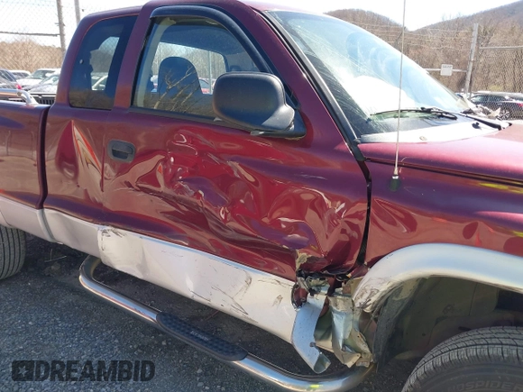 2003 Dodge Dakota SLT with VIN 1D7HG42N33S369870, listed as a IAAI auction lot 41826771 with 214,840 mi miles. Bid and sale history available at carsss.com. Image 6.
